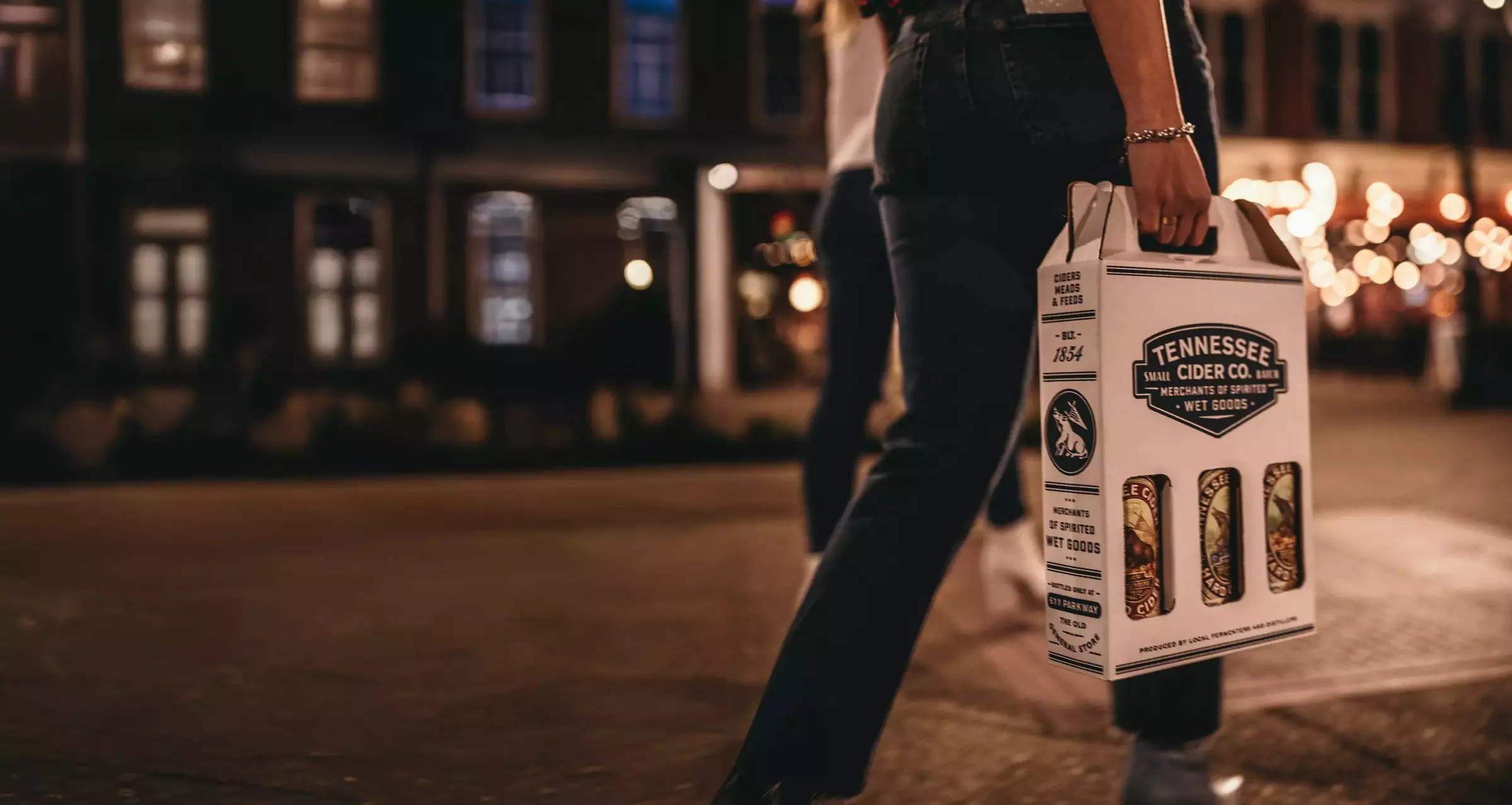 carrying box with bottles of Tennessee Cider Co
