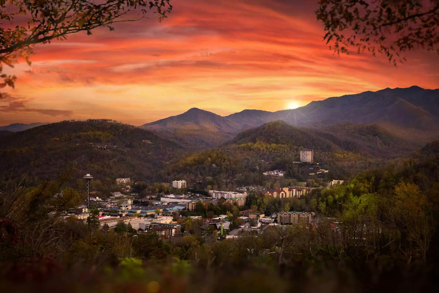 View of downtown Gatlinburg, Tennessee and the Smoky Mountains.