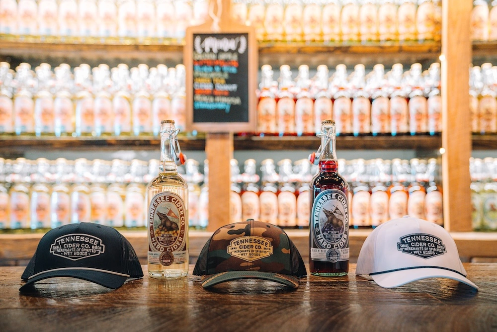 ciders and hats from tennessee cider co.