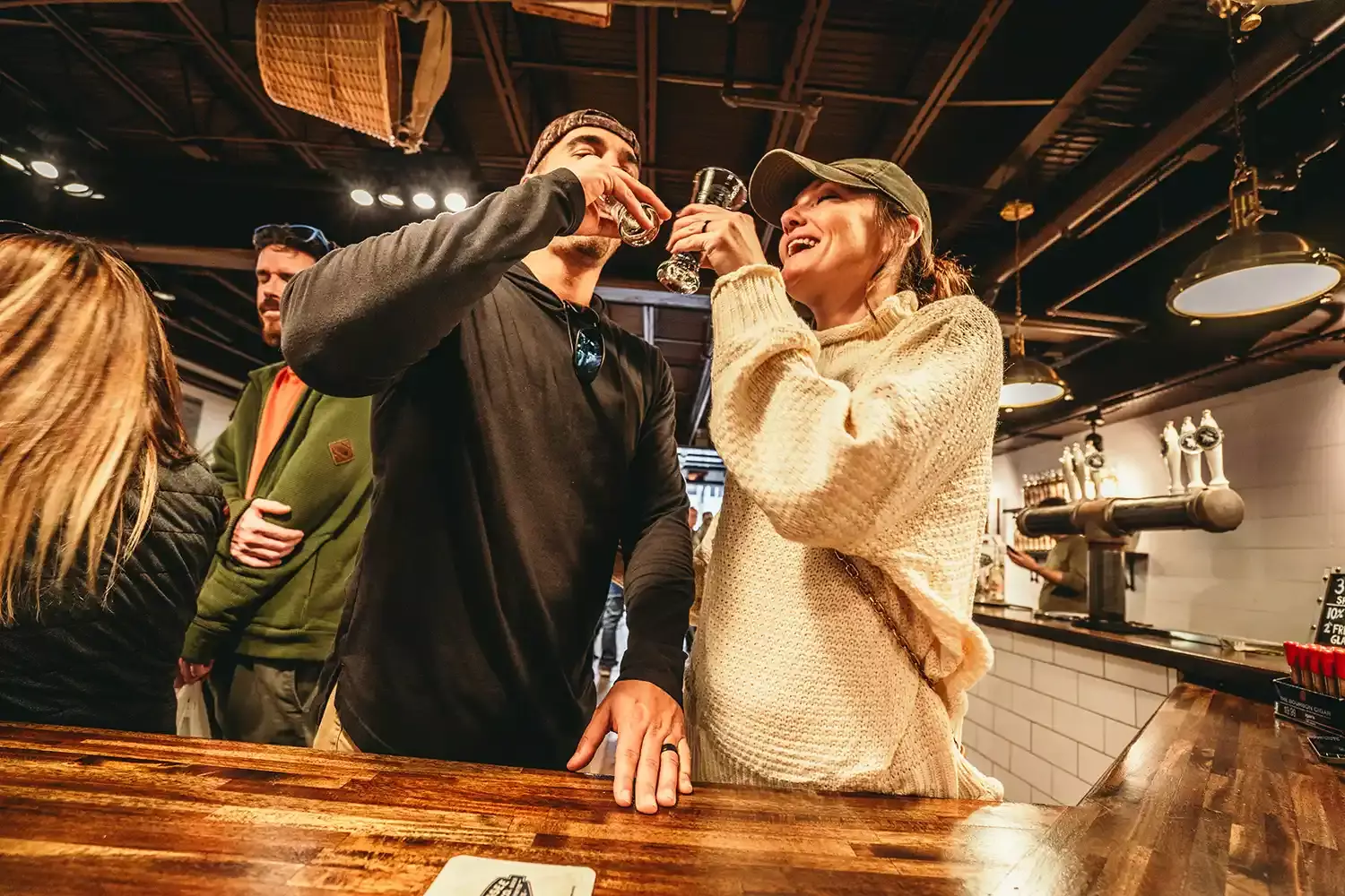 People enjoying free tasting of Tennessee Cider Company.