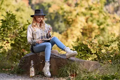 woman drinking hard cider from tennessee cider company