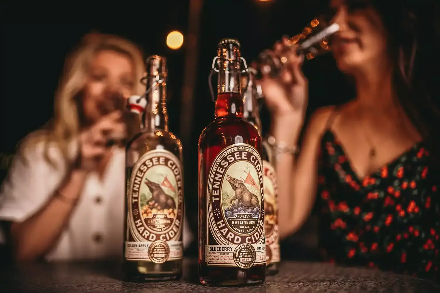 A group of friends enjoying Tennessee Cider Company hard cider