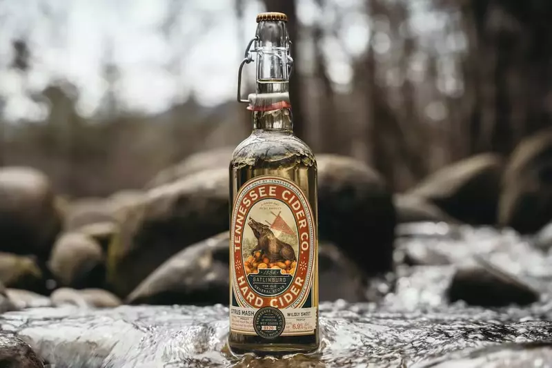 tn cider company bottle in river